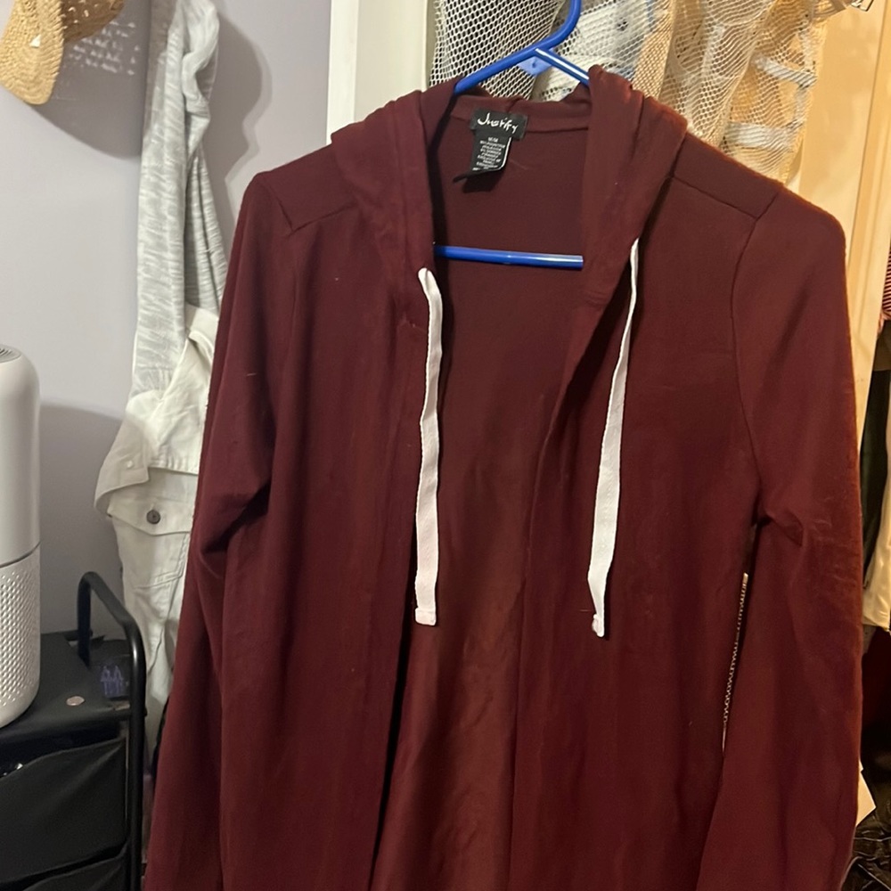 3/4 length sweater jacket burgundy with hood. Never worn.